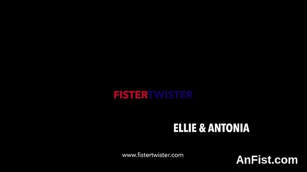 Lesbian chick gets her shaven pussy and anus fist fucked