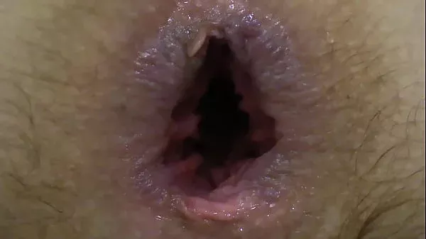 A brunette with a big dildo fucks her anal and stretches the anus and shows beautiful booty in different positions Then she masturbates her hairy cunt