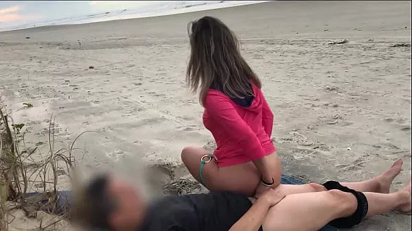 Milf sat with her anus on the dick of a stranger vacationing on the beach