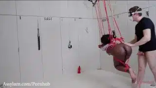 Beautiful black submissive gagged, tied up, ass whipped, and turned into an anal compass needle